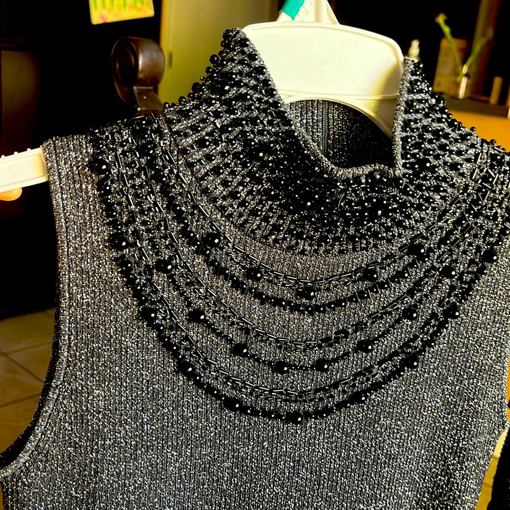 New Shinny stretchy blouse small size .. perfect for a nice party